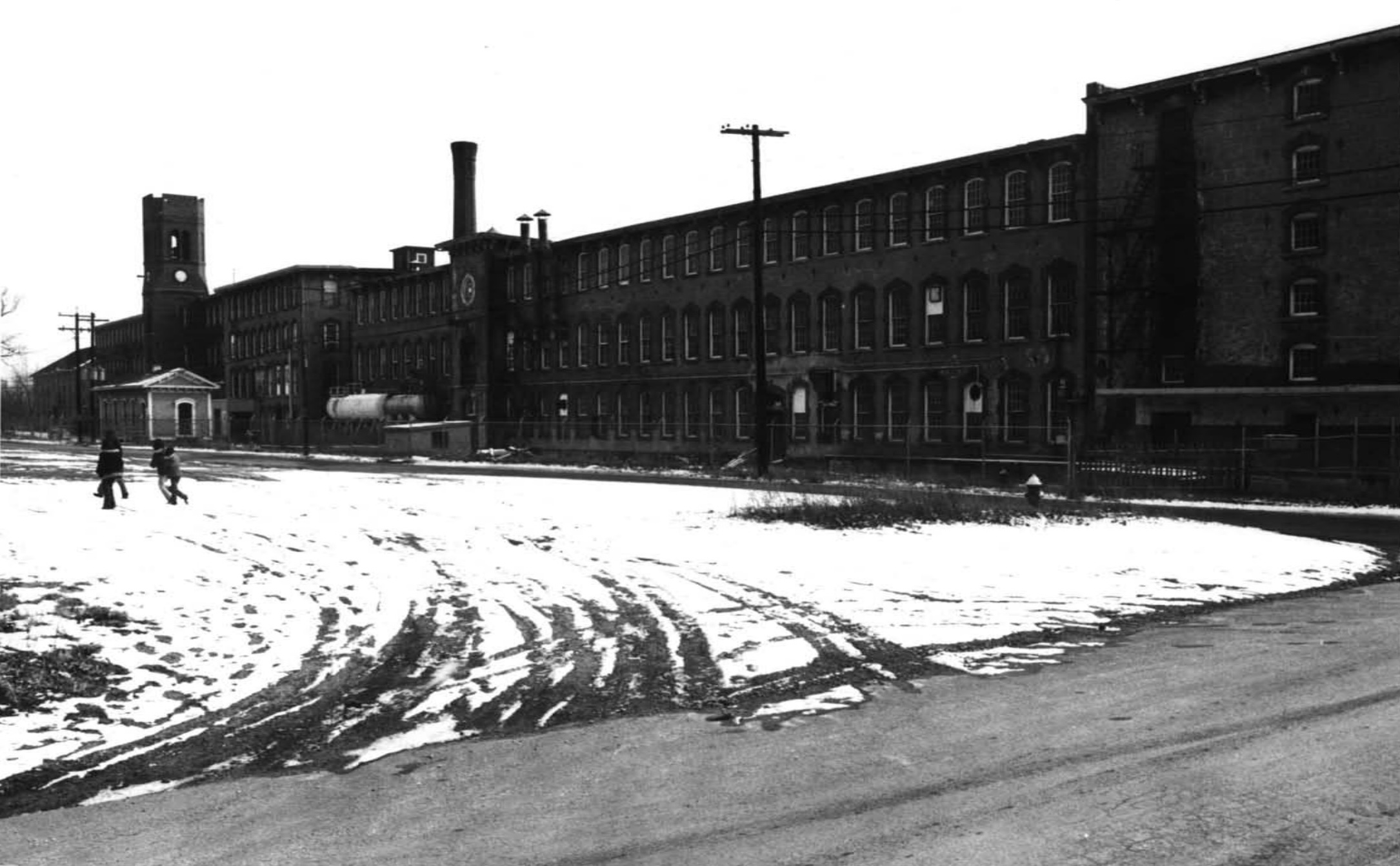 Children playing outside the abandoned Pontiac Mills in 1972